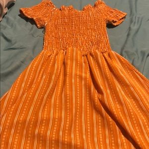 Yellow dress with white designs